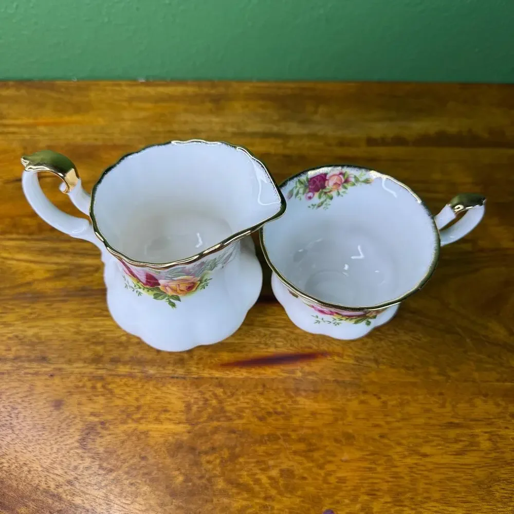 Vintage Royal Albert Creamer and Tea Cup Set England 1962 Gold Trim Bone China